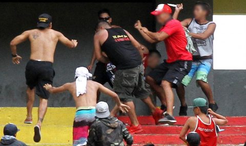 Barcelona SC fans fight each other during match with Macara