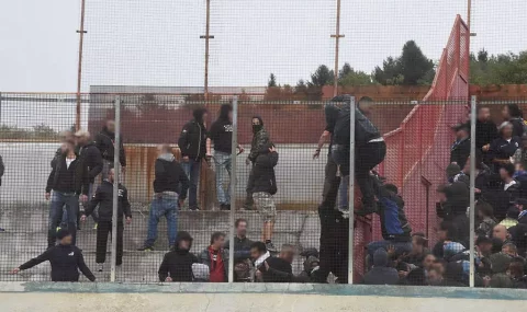 Fans clash in the stands during Italian Serie D match