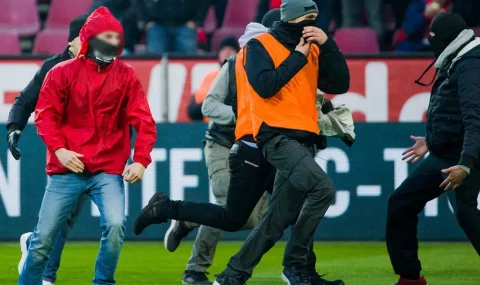 Cologne hools dressed as stewards pinch Gladbach flag