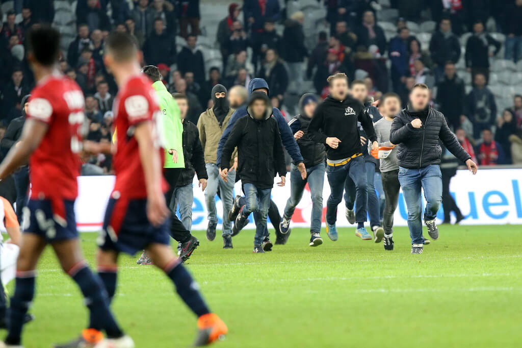 Lille fans invade the pitch