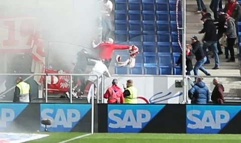 Gladbach hools steal Cologne flag during Bundesliga match