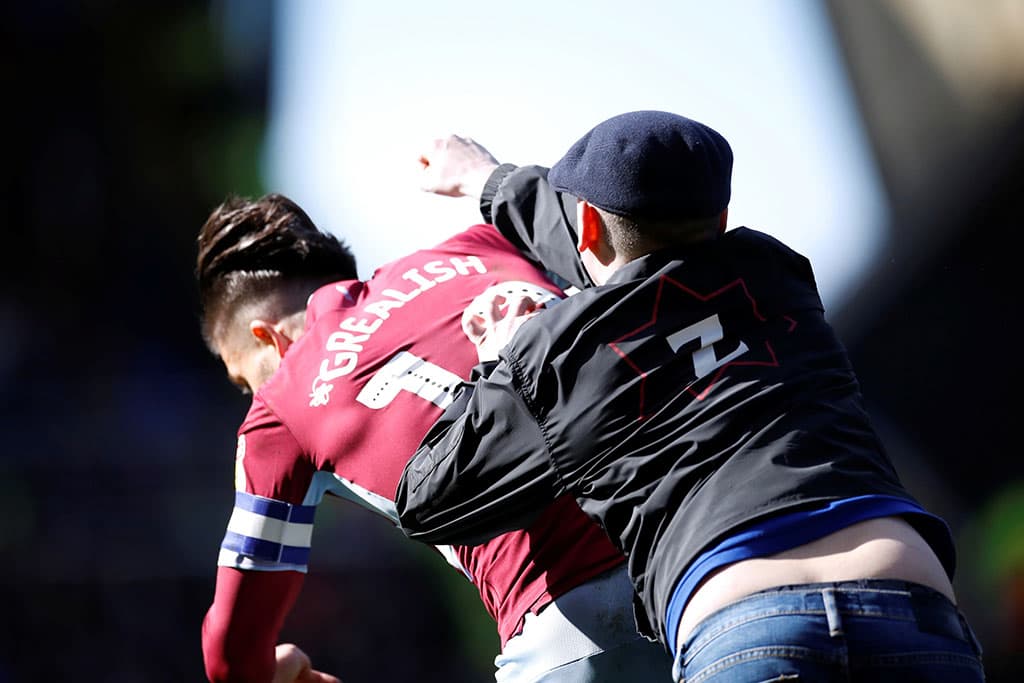 Aston Villa player attacked by fan during Birmingham derby