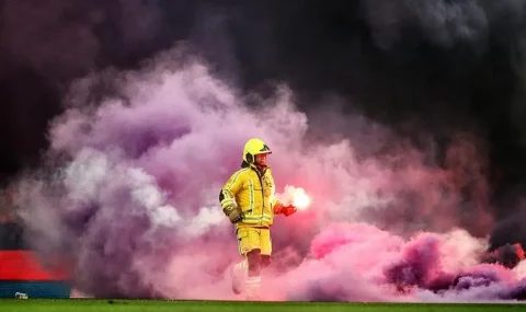 Standard Liege v Anderlecht abandoned as fans throw flares on pitch