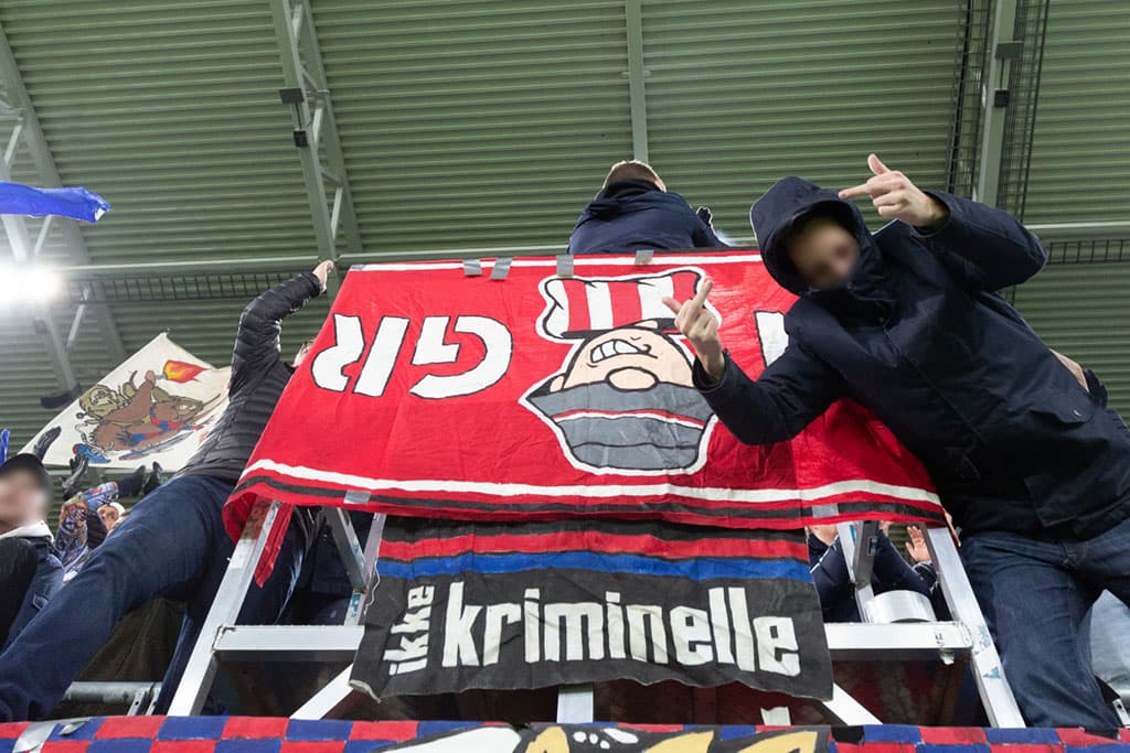 Valerenga fans pinch Brann flag before kick-off