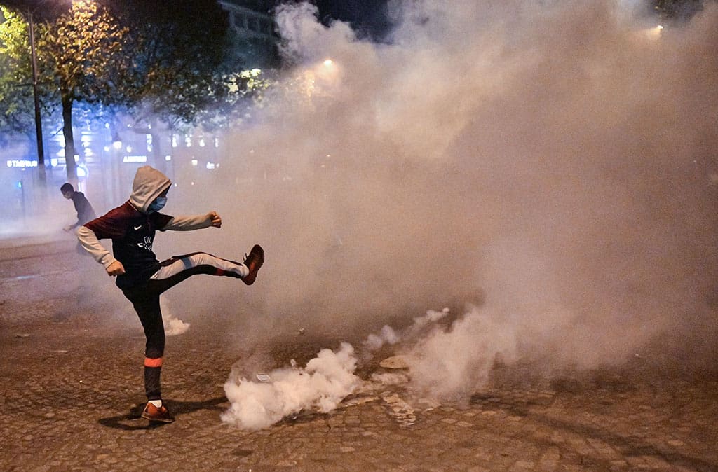 PSG fans clash with riot police after Champions League final defeat