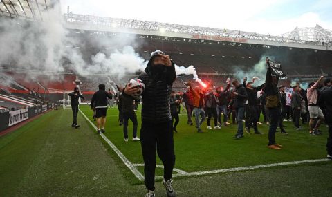 Manchester United fans protest against the club's owners inside Old Trafford ahead of their English Premier League clash against Liverpool.