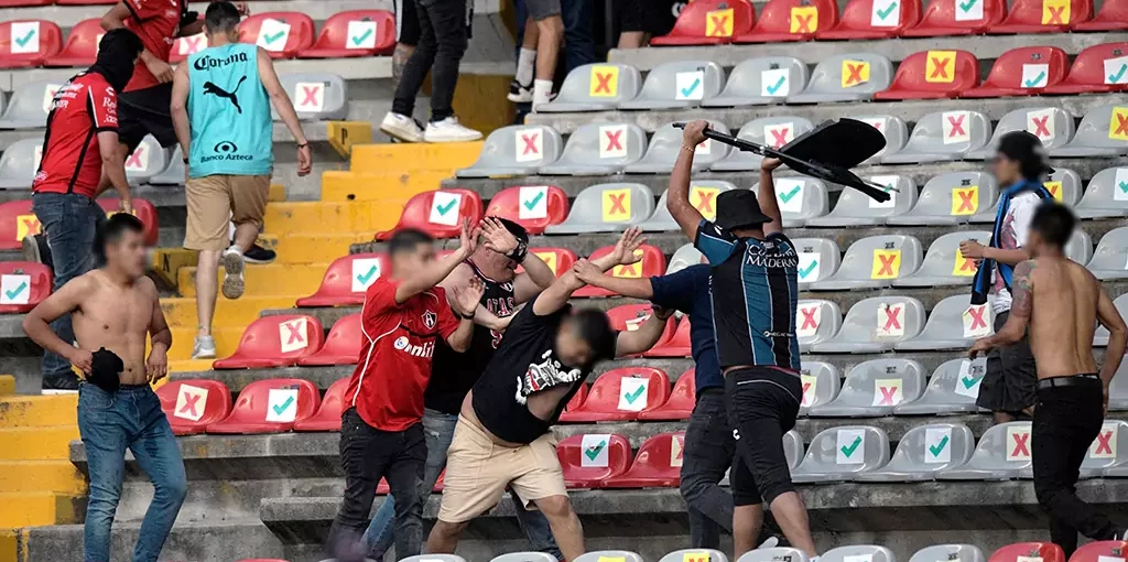 Fans clash during Mexican top-flight match between Queretaro and Atlas