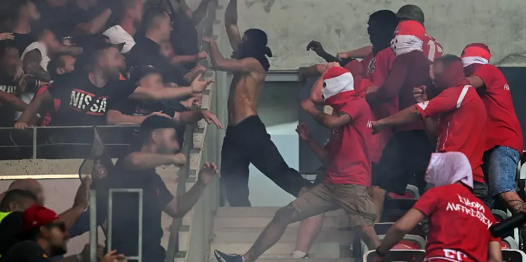 Nice and Cologne fans fight in stands before kick off