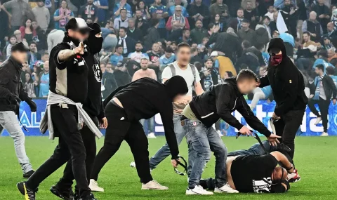 Hooligans fight on pitch after Napoli win Serie A title with draw at Udinese