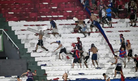 Top-flight match in Paraguay abandoned as fans fight in stands