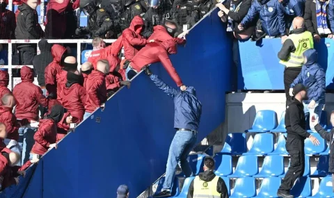 Fans scuffle at Karlsruhe v Kaiserslautern 2. Bundesliga match
