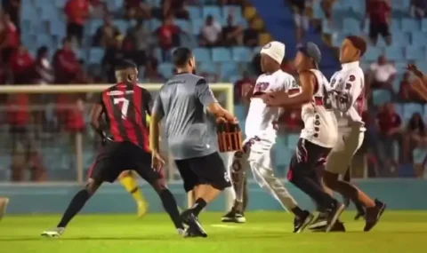 Fans confront players during Brazilian regional league match