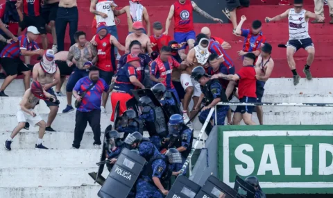 Cerro Porteno fans clash with police during derby against Olimpia